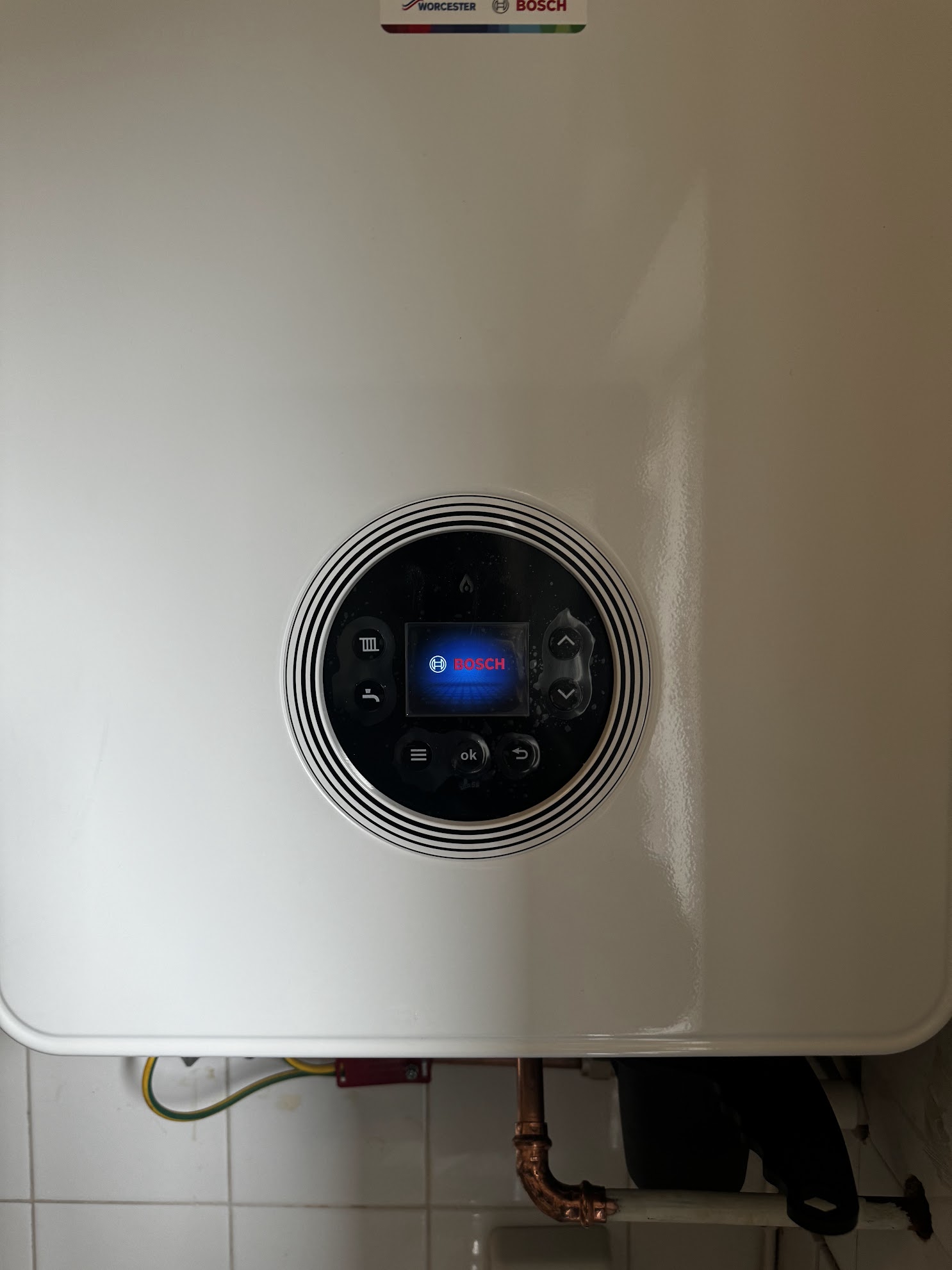 Worcester Bosch boiler control panel powered up after commissioning